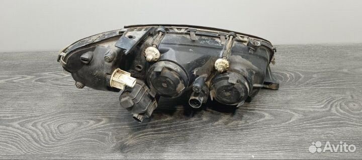 Фара галогеновая передняя левая Opel Omega B 1994