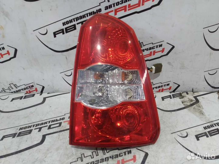 Фонарь chevrolet suzuki forenza lacetti optra J200