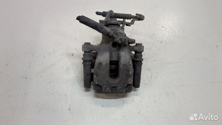 Суппорт левый задний Skoda Octavia (A7)