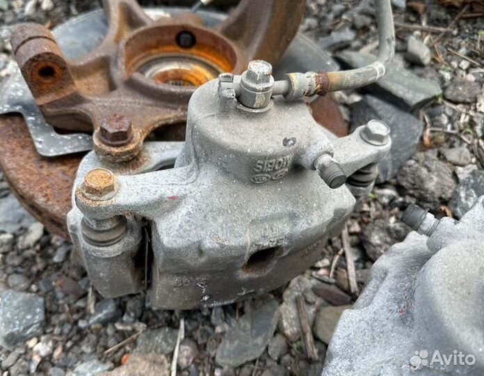 Суппорт тормозной передний левый Kia Soul PS G4NC