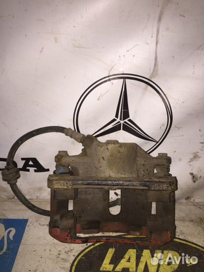 Суппорт тормозной передний левый Renault Megan
