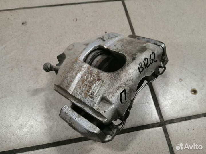 Суппорт тормозной передний правый Форд Фиеста