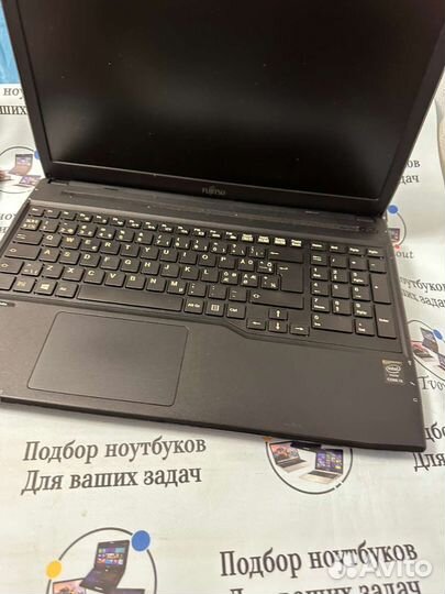 Fujitsu A514 core I3 4005u/4gb ram