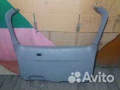 Обшивка двери багажника мазда