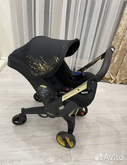 Коляска автокресло Doona gold limited edition