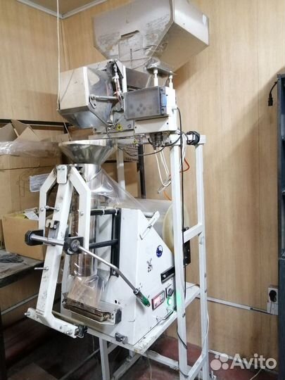 Машина упаковочная с дозатором весовым