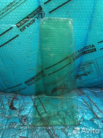 Стекло двери задней левой (форточка) Toyota Land