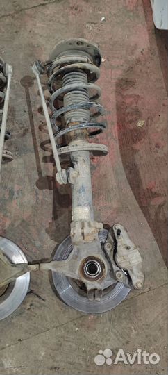 Передние стойки с поворотным кулаком Peugeot 206