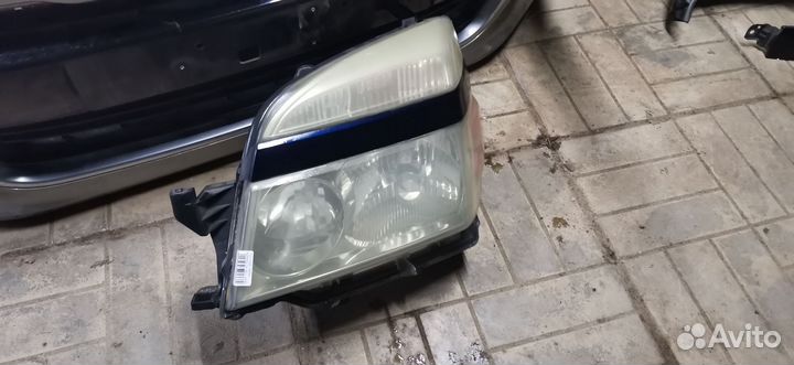 Фара левая Toyota Voxy AZR60G
