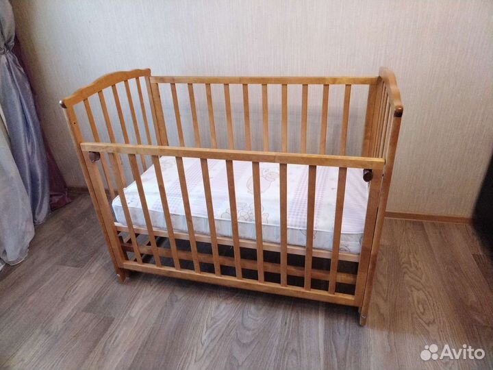 Детская кровать с продольным маятником