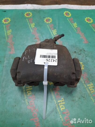 Суппорт передний левый Ford Focus 2 седан 1.8