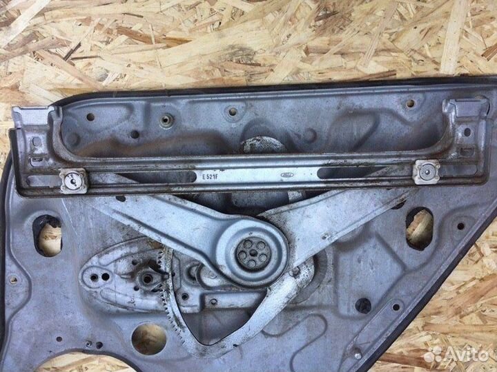 Стеклоподъемник механический задний левый Ford