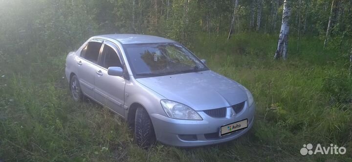 Mitsubishi Lancer 1.6 МТ, 2009, 122 000 км