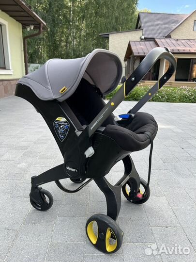 Коляска автокресло doona с базой isofix
