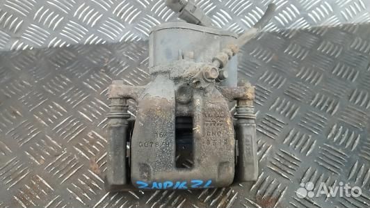 Суппорт тормозной задний левый volkswagen passat B7 (ZNP16LS01)