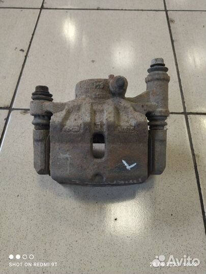 Суппорт тормозной передний левый Kia Picanto 2