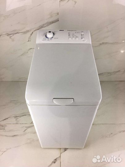 Стиральная машина с вертикальной загрузкой