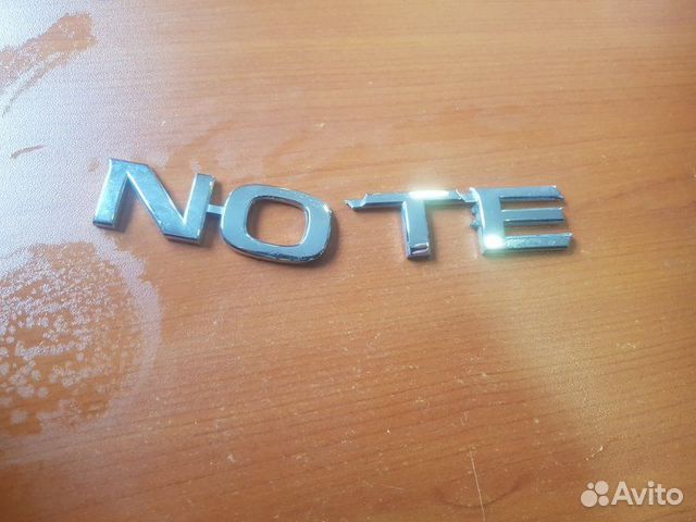 Эмблема задняя Nissan Note E12 2017