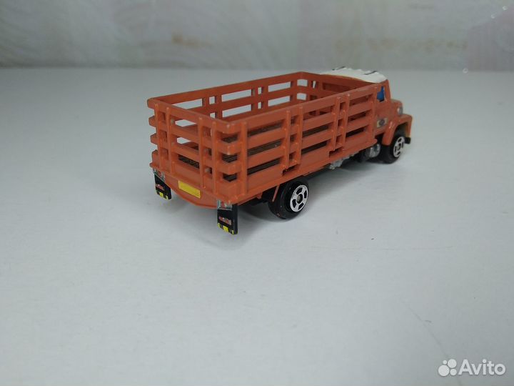 Грузовик американец высокий борт решетка