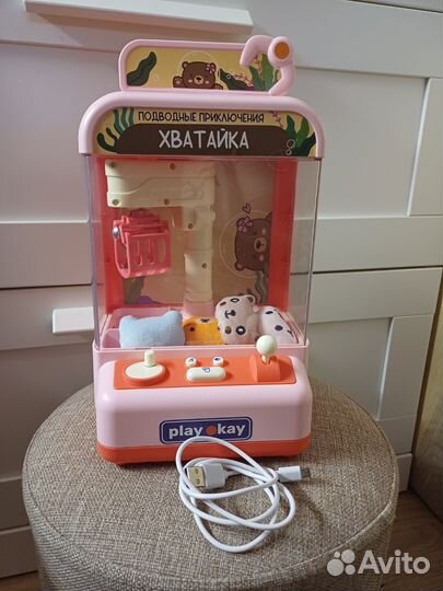 Игровой автомат с игрушками хватайка
