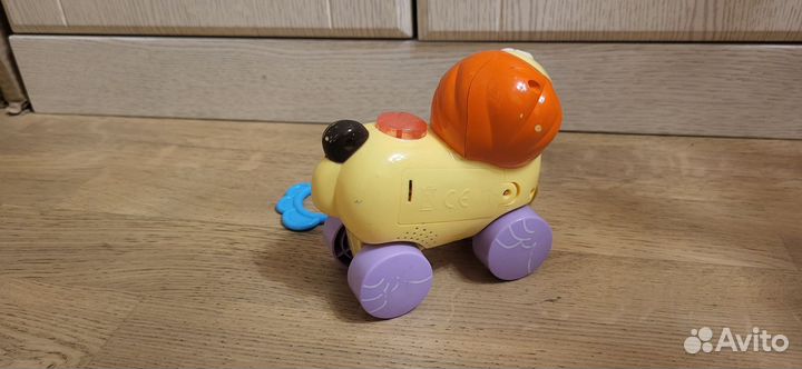 Каталка Лев. Игрушка музыкальная