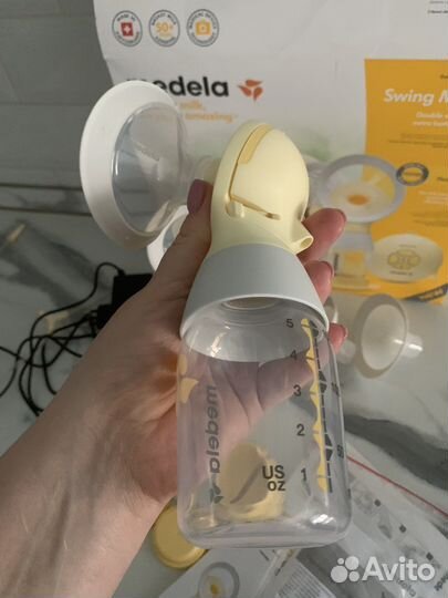 Молокоотсос medela swing maxi flex
