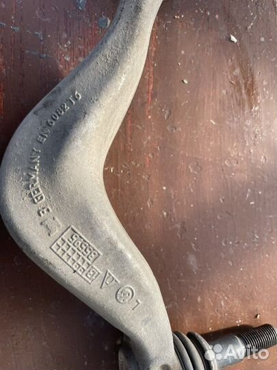 Рычаг передний левый