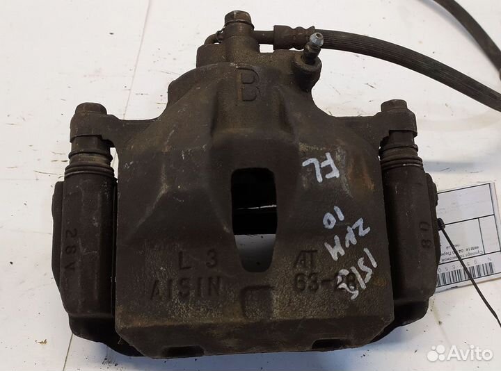 Суппорт тормозной toyota Isis M1 04-10 Передний ле