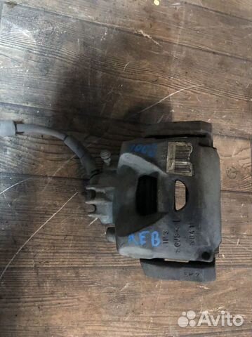 Тормозной суппорт передний Пежо 3008