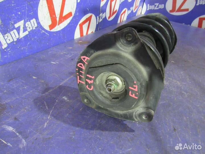 Стойка подвески Nissan Tiida JC11 2004—2012