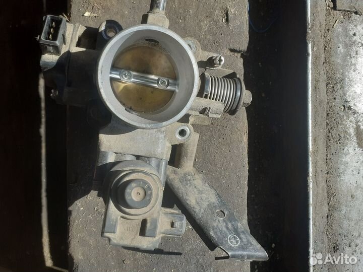 Дроссельная заслонка Kia Spectra