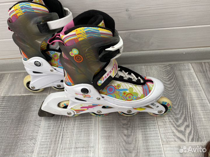 Роликовые коньки