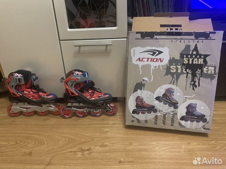 Роликовые коньки