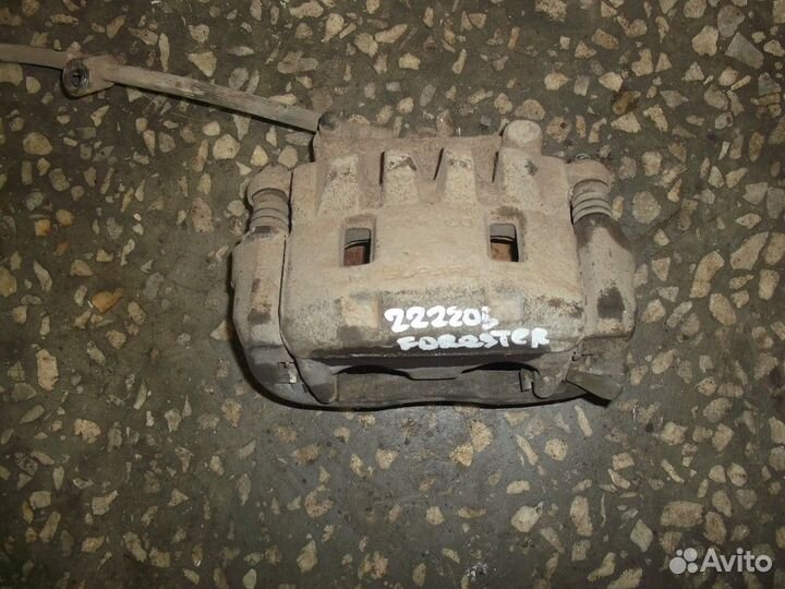 Суппорт передний левый (Subaru Forester)