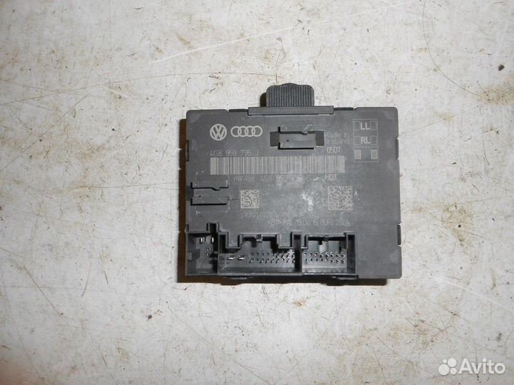 Блок управления задней дверью (Audi A6)