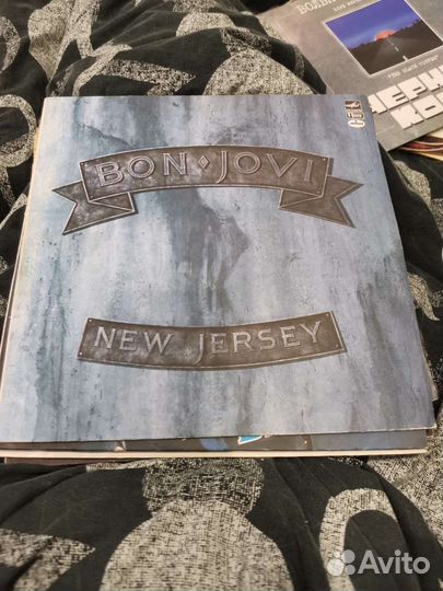 Пластинки Bon Jovi,Цветы и песни Сан-Ремо в Москве