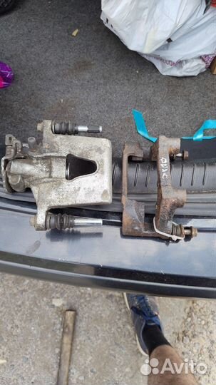 Суппорт и скоба задний правый