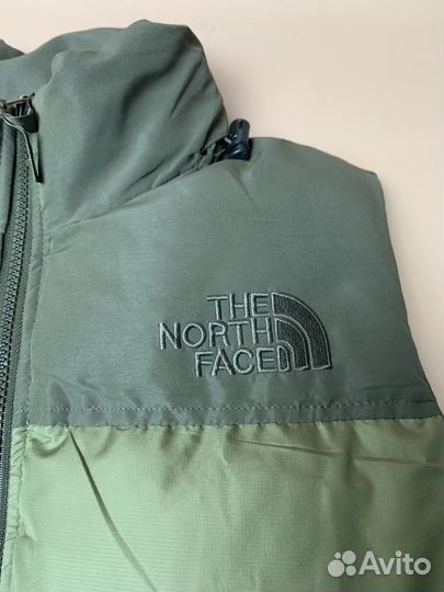 The north face жилетка пух