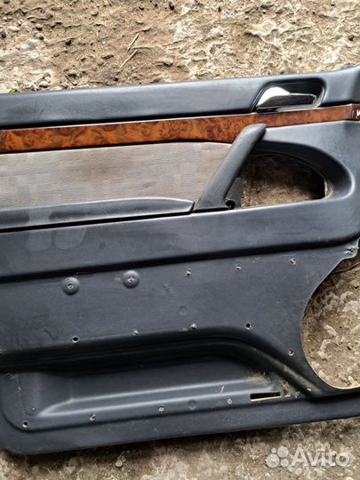 Обшивка двери передний левый Mercedes W140