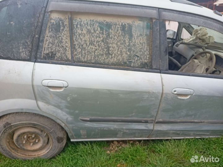 Двери Mazda premacy 2001г