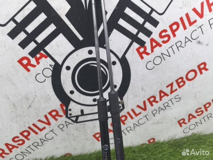 Амортизатор крышки багажника Mazda Axela blefw