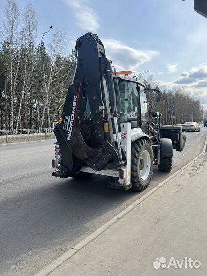 Услуги экскаватора погрузчика,бара,экскаватора