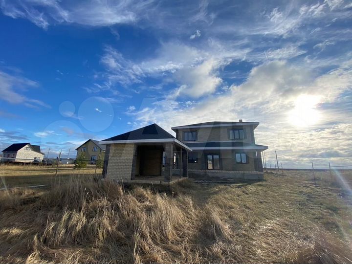 Коттедж 247 м² на участке 15 сот.