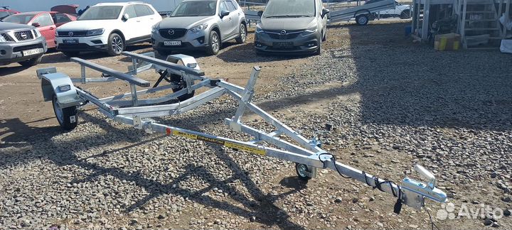 Прицеп для лодок и катеров с откидным кузовом