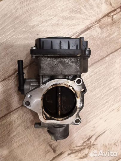 Дроссельная заслонка