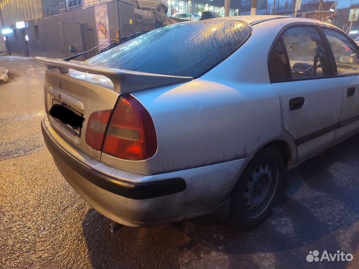 Спойлер mitsubishi carisma