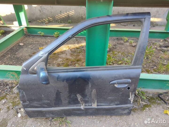 Дверь водительская Nissan Primera P11