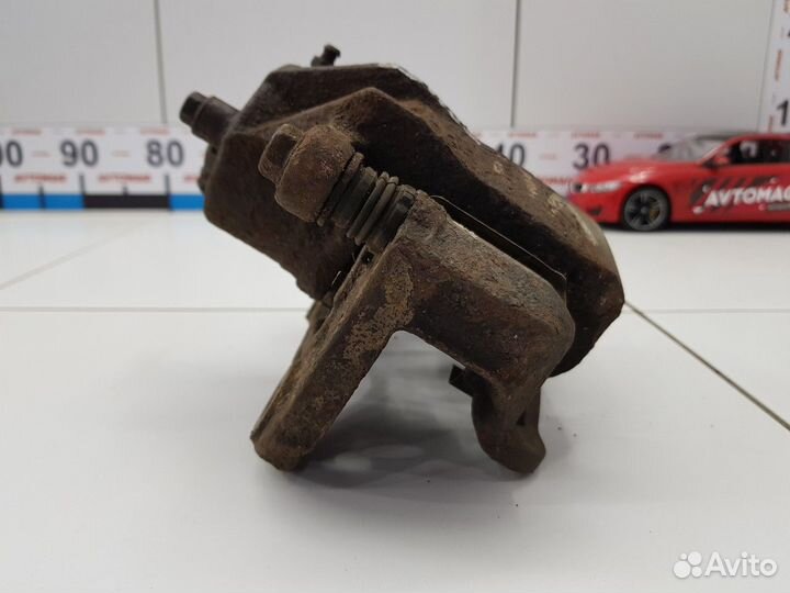 Суппорт передний левый (Hyundai Sonata)