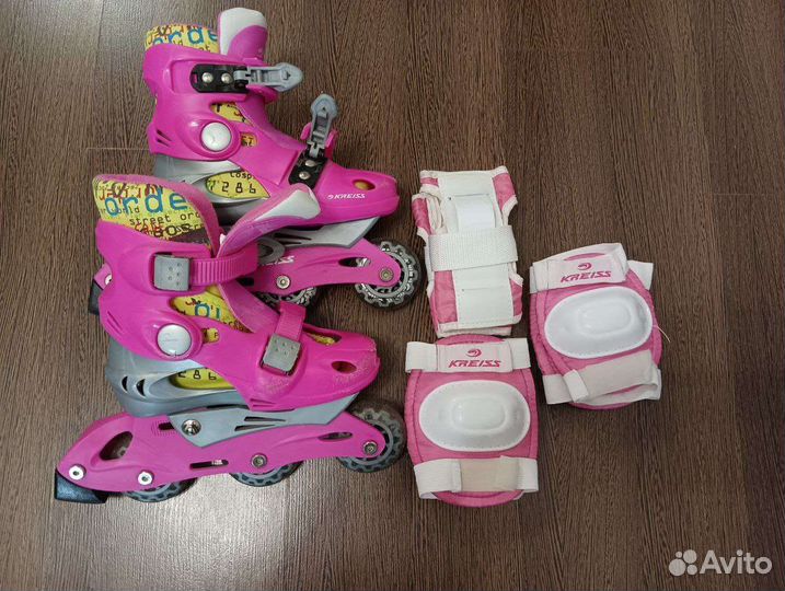 Роликовые коньки