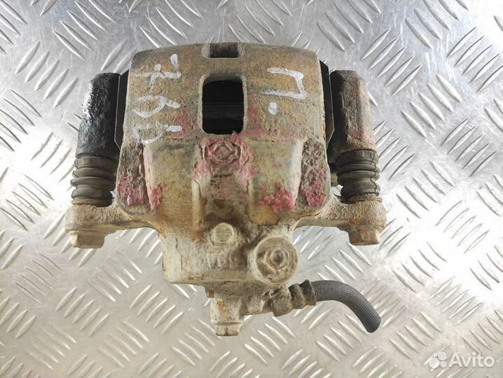 Суппорт передний правый Nissan Almera N15